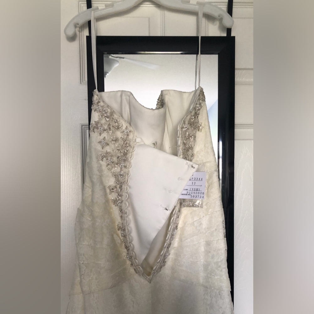 NWT: David's Bridal Ivory Wedding Dress with lace Details and beaded belt